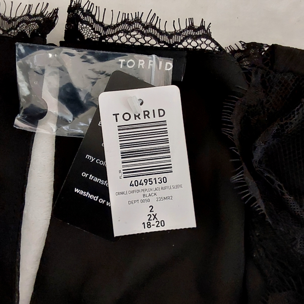 TORRID Crinkle Chiffon Peplum Lace Ruffle Sleeve Top - Picture 8 of 12